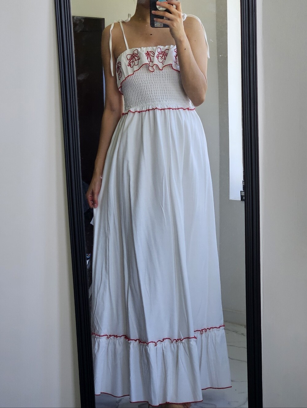 White maxi dress with red embroidery